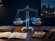 University transcript, calculator, grade cards, and a glowing balance scale on a desk.
