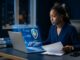 A Nigerian student uploads a certificate beside a laptop with a blue admissions dashboard.