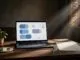 A laptop, blank certificate, and pen arranged on a desk with blue accents.